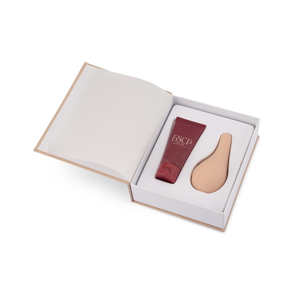 ESCP Whisper Blush ritual set inside its luxury gift packaging